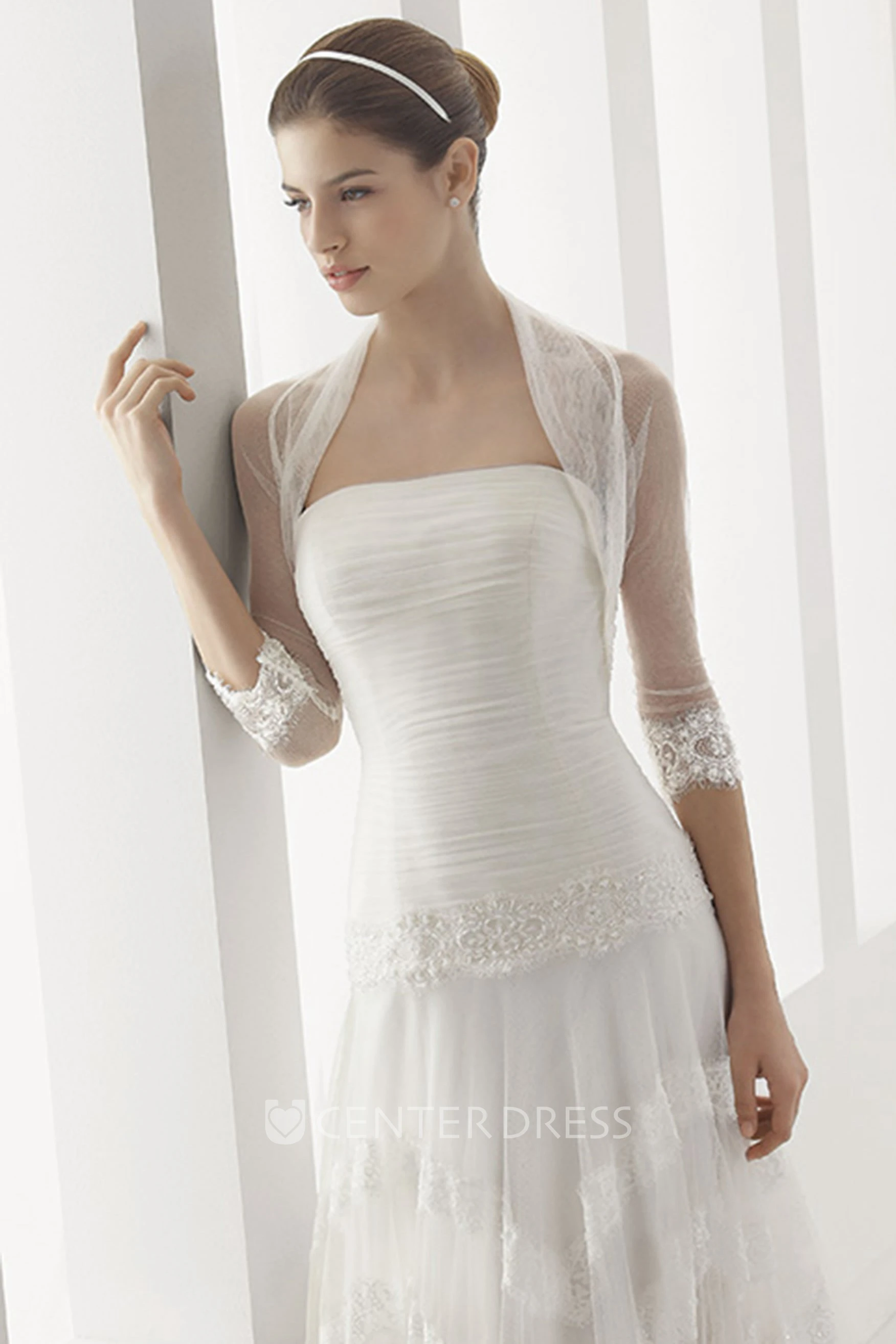 Strapless Tulle Gown With Ruched Bodice And Drop Jewel Waist