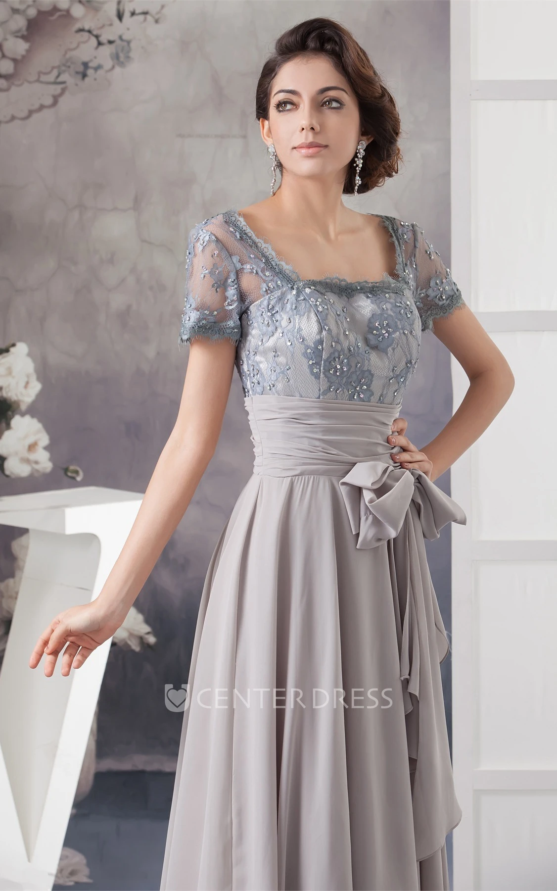 Chiffon Pleated Gown with Bow and Illusion Caped Sleeve