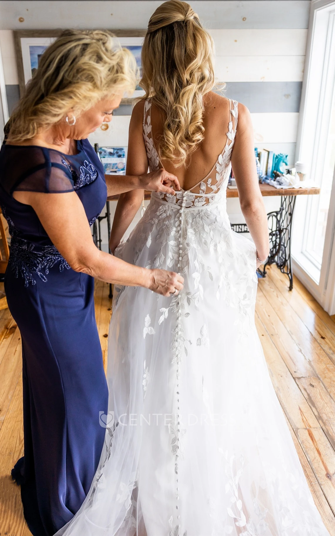 Elegant A-Line Plunging Neck Tulle Sweep Train Wedding Dress with Appliques