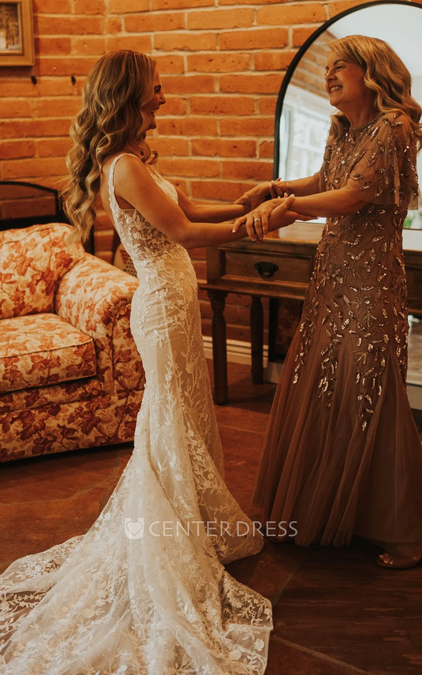 Elegant Lace Mermaid Wedding Dress with V-neck and Sweep Train Simple and Ethereal