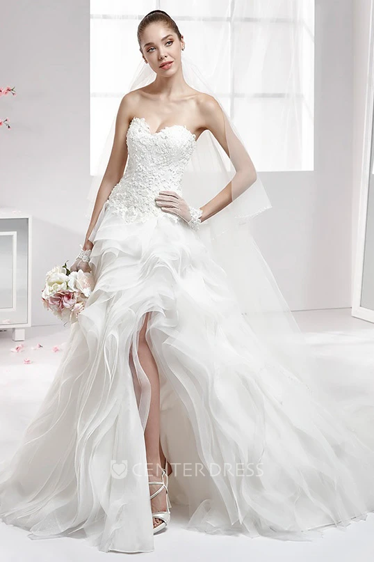 Sweetheart High-Low Wedding Gown with Ruffled Skirt and Lace Corset