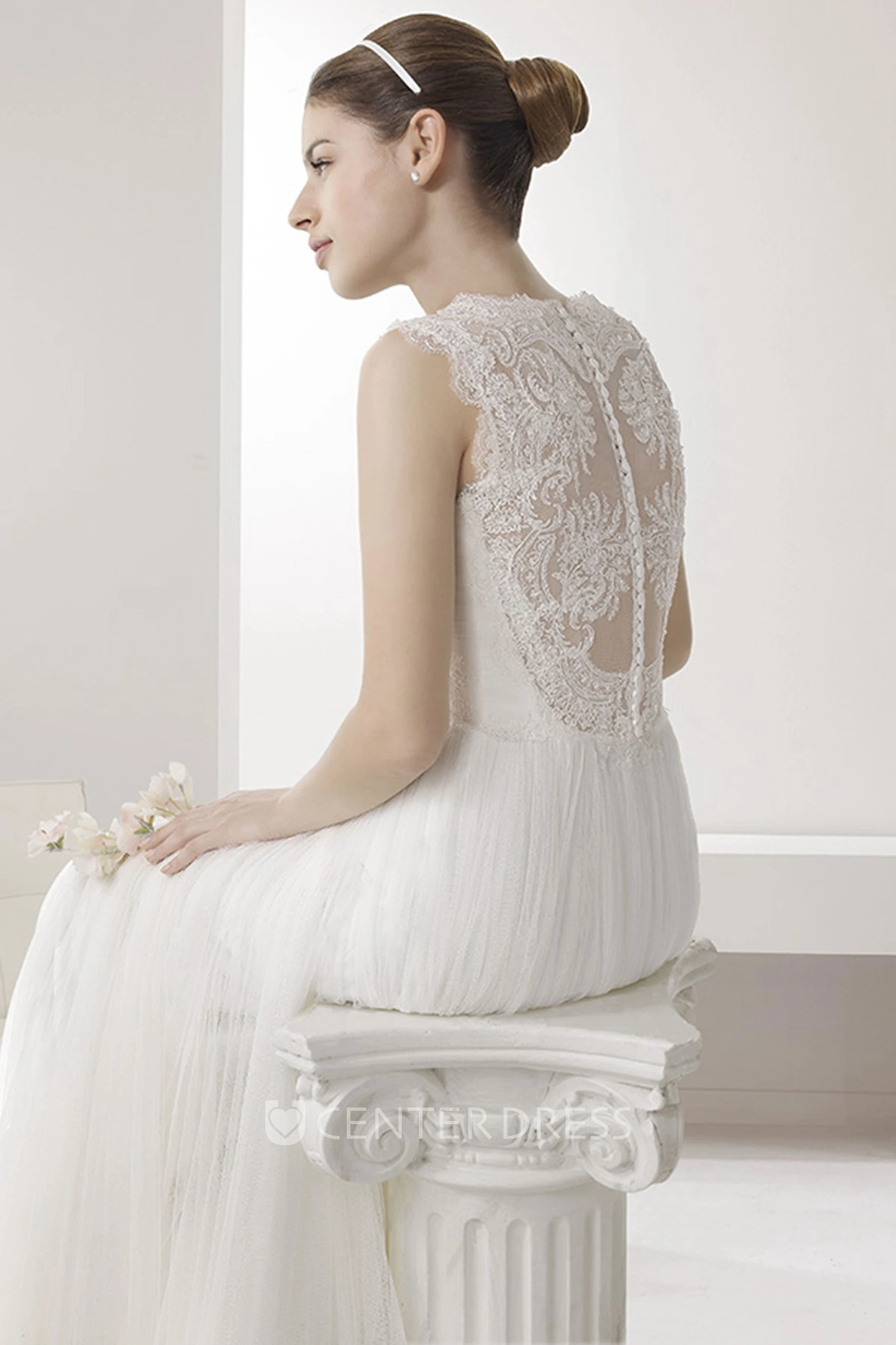 High Neck Sleeveless Tulle Gown With Lace Bodice And Pleated Skirt