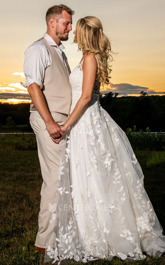 Elegant A-Line Plunging Neck Tulle Sweep Train Wedding Dress with Appliques