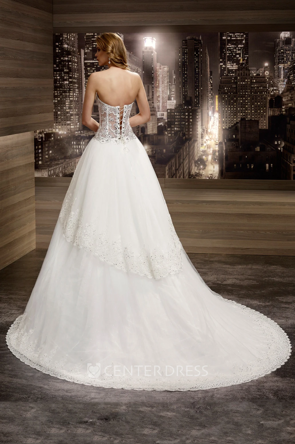 Sweetheart Illusion Beaded A-Line Bridal Gown With Peplum And Brush Train