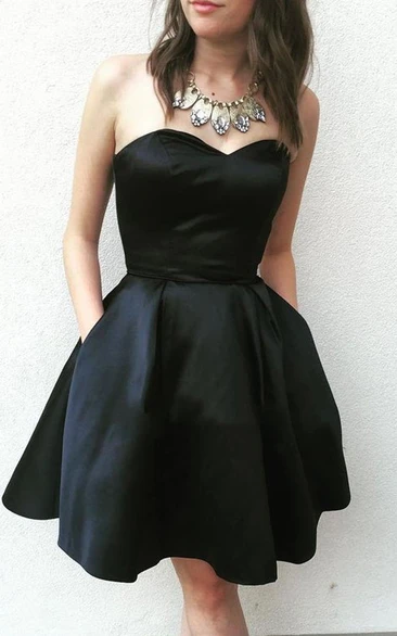 A Line Sleeveless Satin Modern Homecoming Dress with Pleats and Pockets
