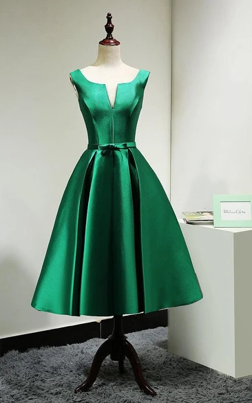 Tea length store emerald green dress