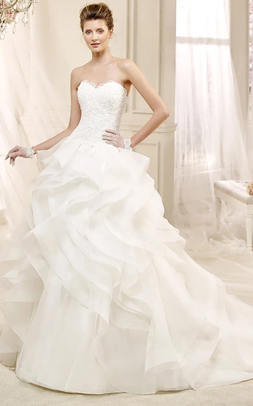 Sweetheart Appliqued A-Line Wedding Dress With Cascading Ruffles And Brush Train