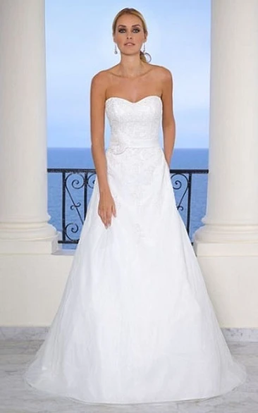 A-Line Appliqued Floor-Length Strapless Organza Wedding Dress With Flower