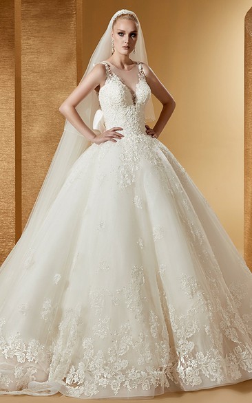 Feminine Cap Sleeve Ball Gown With Illusive Neckline And Back Bow