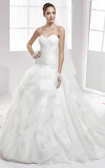 Sweetheart Beaded Wedding Gown With Cascading Ruffles and Pleated Bodice