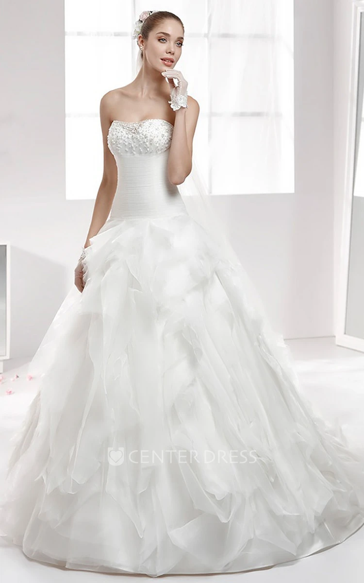 Strapless Wedding Gown With Ruffled Skirt and Beaded Bust