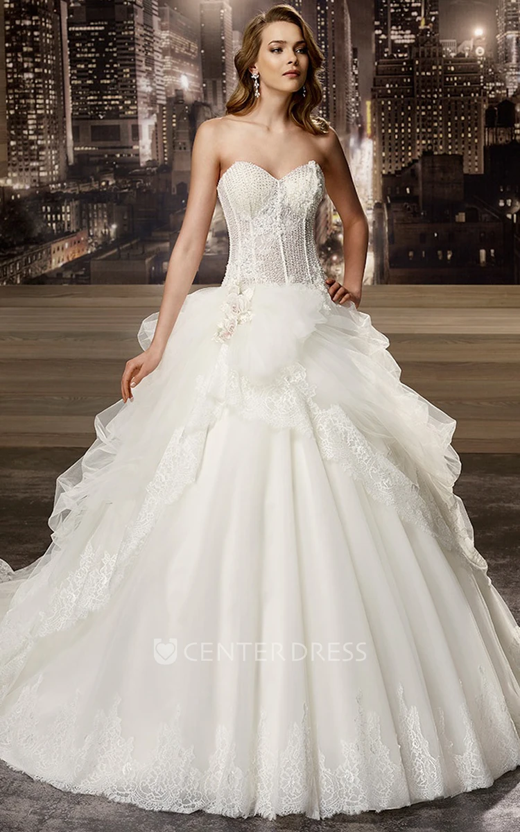 Sweetheart A-line Wedding Gown with Beaded Corset and Asymmetrical Ruffles